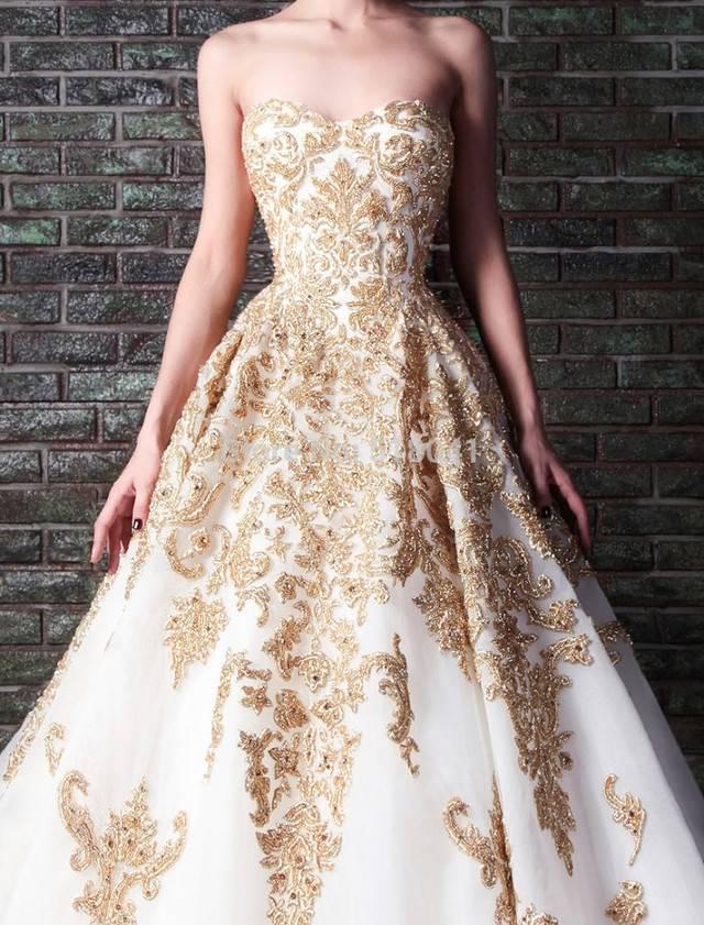 รูปภาพ:http://femarea.com/wp-content/uploads/2015/06/Gold-wedding-dress-30-779x1024.jpg