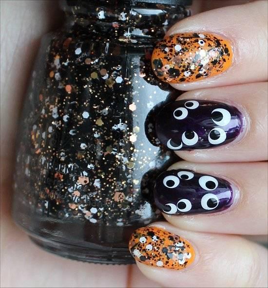 รูปภาพ:http://www.prettydesigns.com/wp-content/uploads/2015/09/Glittery-Halloween-Nail-Design.jpg