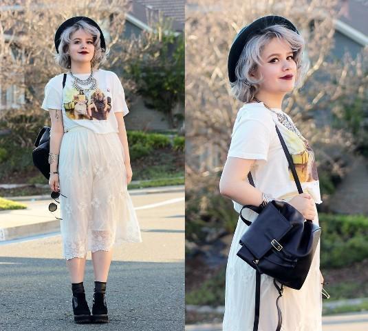 รูปภาพ:https://i.styleoholic.com/2018/05/With-printed-t-shirt-lace-midi-skirt-black-hat-and-black-boots.jpg