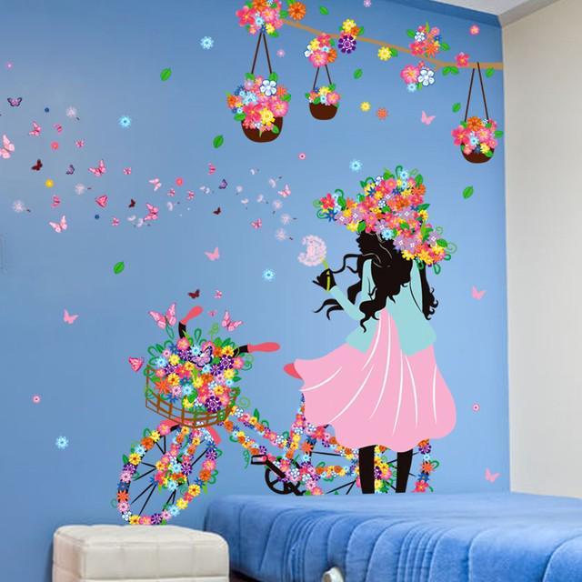 รูปภาพ:https://ae01.alicdn.com/kf/HTB1C2i5LVXXXXc0XVXXq6xXFXXXu/Fashion-Lady-blowing-Dandelion-Wall-Paper-Art-Girls-Room-Wall-Decals-Stickers-Butterfly-Flowers-Bike-Girl.jpg