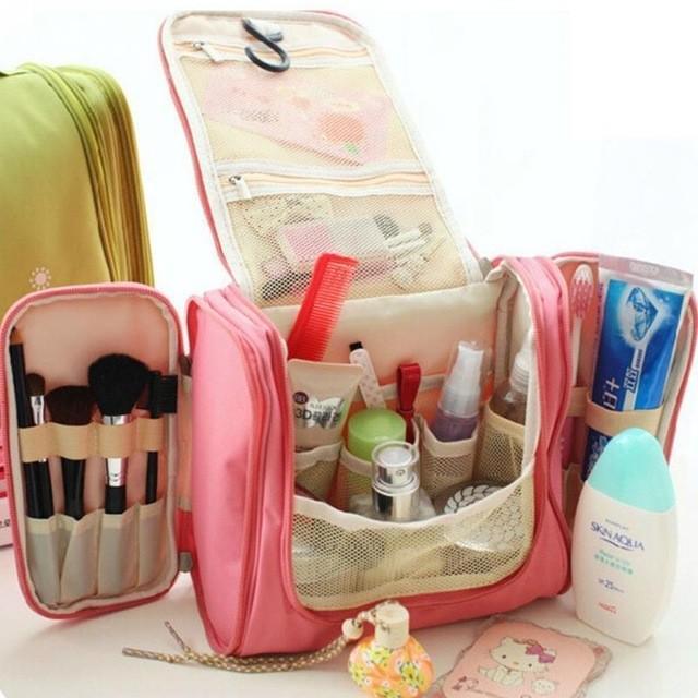 รูปภาพ:https://ae01.alicdn.com/kf/HTB1r14saMMPMeJjy1Xcq6xpppXax/Multifunctional-Woman-Toiletry-Makeup-Kit-Bag-Storage-Waterproof-Cosmetic-Bag-Picnic-handBag-Organizer-travel-Toiletry-bag.jpg_640x640.jpg