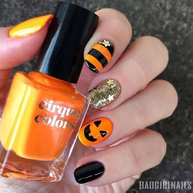 รูปภาพ:https://stayglam.com/wp-content/uploads/2018/08/Halloween-Pumpkin-Stripes-and-Glitter.jpg