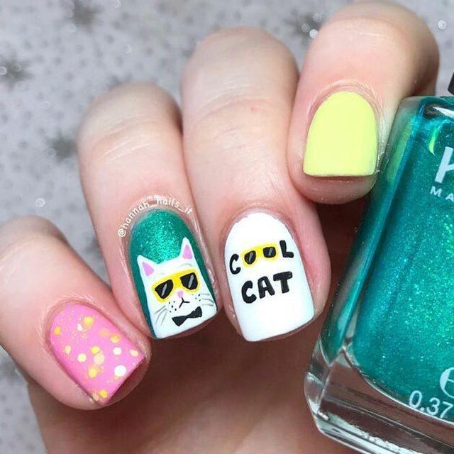 รูปภาพ:https://naildesignsjournal.com/wp-content/uploads/2018/10/cat-nails-pink-green-white-yellow-color.jpg