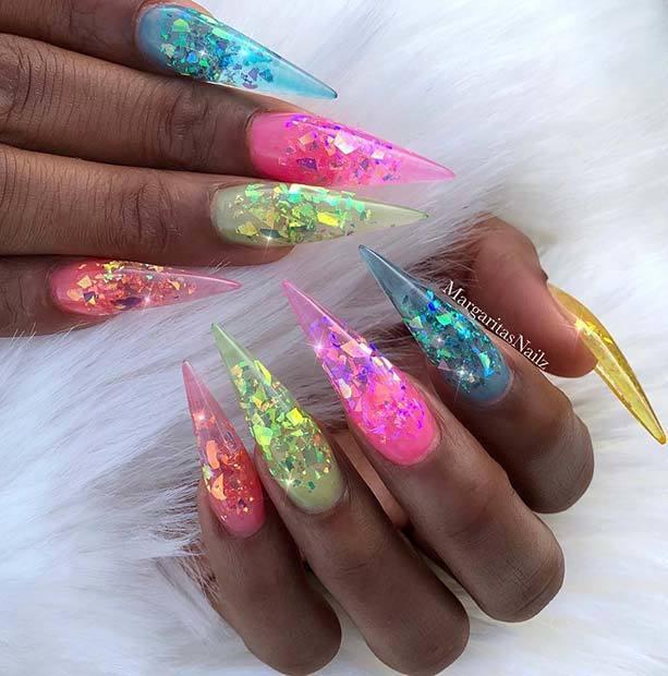 รูปภาพ:https://stayglam.com/wp-content/uploads/2018/09/Vibrant-Glitter-Rainbow-Nails.jpg