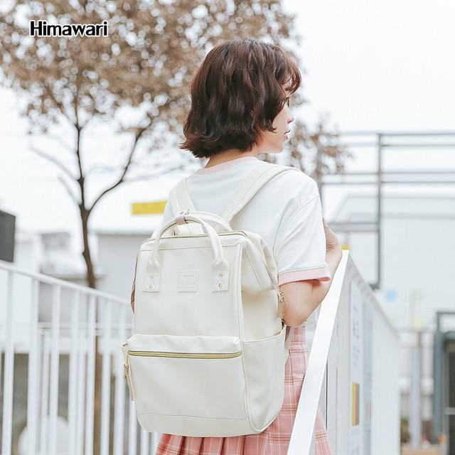 รูปภาพ:https://sc01.alicdn.com/kf/HTB1E_mcazoIL1JjSZFyq6zFBpXag/Himawari-PU-black-large-shopping-outdoor-bag.jpg