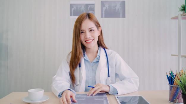 รูปภาพ:https://www.freepik.com/free-photo/confident-asian-female-doctor-sitting-office-desk-smiling-camera_4014695.htm#page=3&query=doctor%20nurse%20clinic&position=34