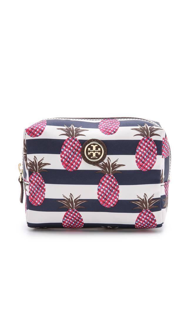 รูปภาพ:https://cdnd.lystit.com/photos/a2b5-2015/03/13/tory-burch-pineapple-stripe-brigitte-cosmetic-case-pineapple-stripe-product-0-999137663-normal.jpeg