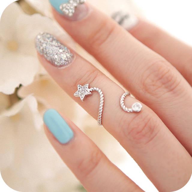 รูปภาพ:http://i01.i.aliimg.com/wsphoto/v0/1531064599/Promotion-Wholesale-Fashion-women-jewelry-rhinestone-five-pointed-star-flower-butterfly-joint-finger-ring-SR291.jpg
