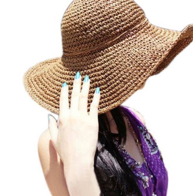 รูปภาพ:http://g02.a.alicdn.com/kf/HTB1DVdTIXXXXXbEXXXXq6xXFXXXM/Latest-Fashion-Woman-Ladies-Bohemia-Straw-Hat-Wide-Brim-Roll-up-Sun-Visor-Hand-Crocheted-for.jpg