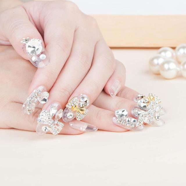 รูปภาพ:http://www.dhresource.com/albu_822265970_00-1.0x0/new-fashion-hot-beauty-crystal-cute-nail.jpg