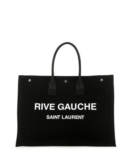 รูปภาพ:https://cdna.lystit.com/520/650/n/photos/cettire/eaa4faef/saint-laurent-Black-Rive-Gauche-Logo-Print-Tote-Bag.jpeg