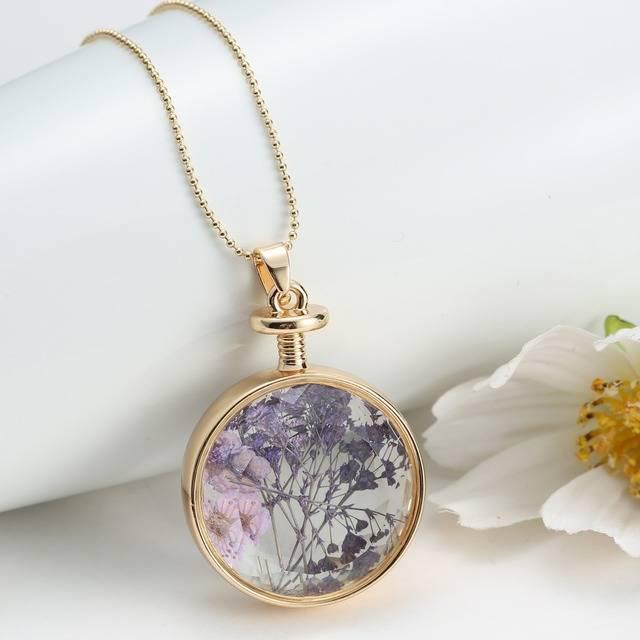 รูปภาพ:http://g01.a.alicdn.com/kf/HTB1Vci6IpXXXXbSXXXXq6xXFXXXy/fashion-New-arrive-Trendy-Plant-DIY-Locket-Dried-Flower-Bottle-Glass-Gift-Natural-Locket-Necklace-Women.jpg